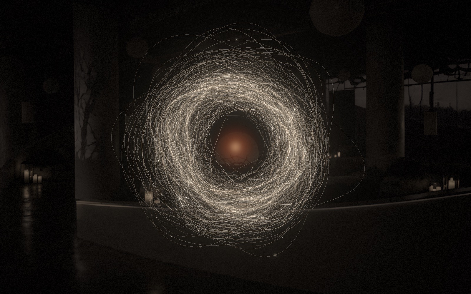 The nest: a ring of woven light round an ember egg, in the dark Gallery. Visualised.